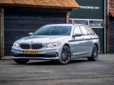 Financial Leas BMW 5 Serie Touring 520i High Executive Bose Memmory zwart Leder trekhaak NAP