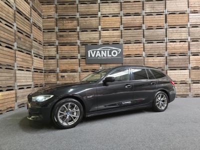 Financial Lease BMW 3 Serie Touring 330e Business Edition Sport Plus Leder Pano Navi Clima Cruise Trekhaak