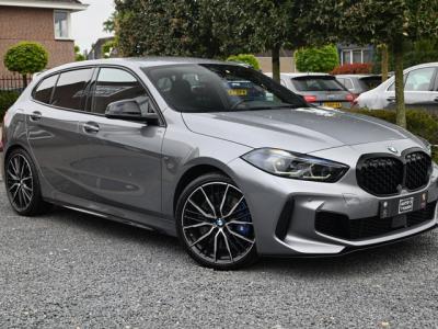 Financial Lease BMW 1-serie M135i xDrive High Executive Color Vision 306 PK Dealer o.h Harman Kardon Camera 19''