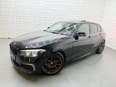 Financial Lease BMW 1-serie M140i xDrive SCHUIFDAK MEMORY LEER ICE UITLAAT