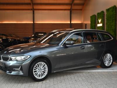 Financial Leas BMW 3 Serie Touring 320i High Executive Edition - Adaptive Cruise Control - Memory - Panoramadak - El. Trekhaak - Dashboard Leder