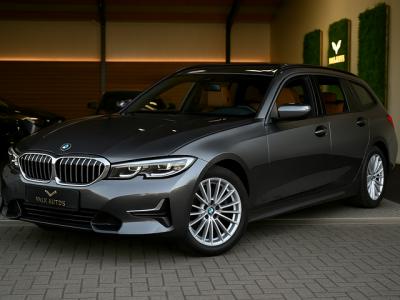 Financial Lease BMW 3 Serie Touring 320i High Executive Edition - Adaptive Cruise Control - Memory - Panoramadak - El. Trekhaak - Dashboard Leder