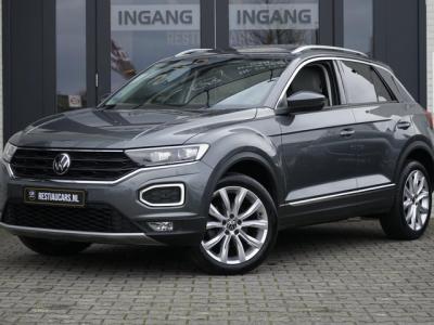Financial Leas Volkswagen T-Roc 1.5 TSI Sport AUTOMAAT-ACC-CAMERA-CLIMA-FULL LED-KEYLESS-NAVIGATIE-PANORAMA-VIRTUEEL-VOLLEDER-STOELVERWARMING