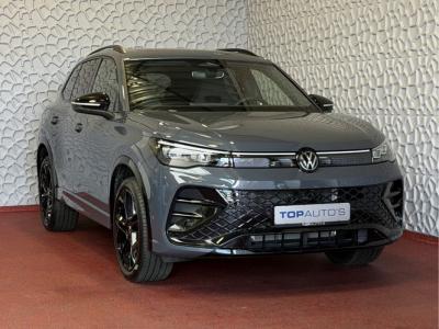 Financial Leas Volkswagen Tiguan 1.5 eHYBRID 272 PK R-LINE VW.TREKHAAK BLACK PANO XL.NAVI STOEL