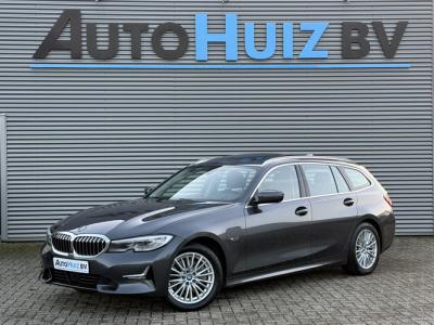 Financial Leas BMW 3 Serie Touring 320e Luxury Line Head Up ACC Innovatie pakket Laser licht Panoramadak Trekhaak