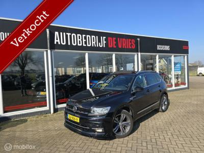 Financial Leas Volkswagen Tiguan 1.4 TSI R-line Nieuwe motor slechts 20dkm! Zeer complete uitvoering.
