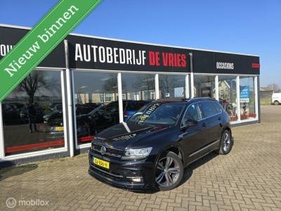Financial Leas Volkswagen Tiguan 1.4 TSI R-line Nieuwe motor slechts 20dkm! Zeer complete uitvoering.